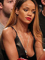 Rihanna legs and cleavage at Barclays Center