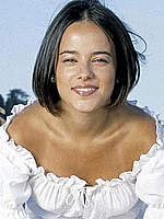 French singer Alizee posing in white clothing