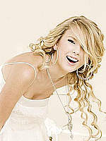 Taylor Swift sexy posing for two photoshoots