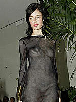 Nicole Trunfio nude under transparent dress