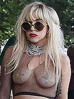 Lady Gaga almost nude in fishnet clothing