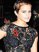 Emma Watson shows her sexy legs at premiere