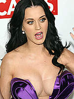 Katy Perry shows deep cleavage and panties