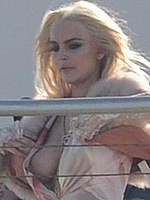 Lindsay Lohan boob out and upskirt in Miami