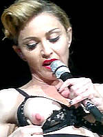Madonna exposed her nude tits on the stage
