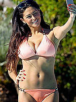 Casey Batchelor cameltoe in bikini poolside