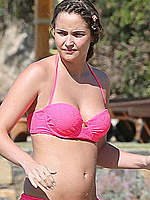 Jacqueline Jossa in pink bikini on a beach