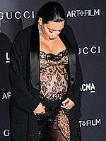 Pregnant Kim Kardashian in see through dress