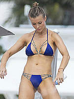 Joanna Krupa sexy in blue bikini on a beach