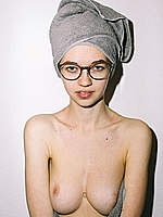 Kim Baltes nude in a bathtub and on a bed