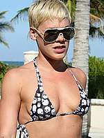 Pink caught in bikini on a beach by paparazzi
