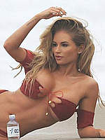 Amy Lee Summers in red bikini on a beach