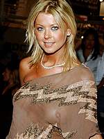 Tara Reid nice cleavage and see through shots