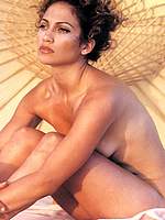 Jennifer Lopez posing sexy and without bra