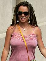 Pregnant Britney Spears without bra under shirt