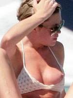 Abigail Clancy in bikini & topless on a yacht