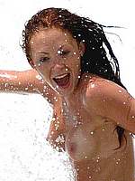 Natasha Hamilton scans and topless on a beach