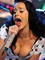 Katy Perry deep cleavage and legs on a stage