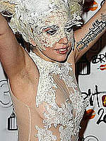 Lady Gaga nipple slip and ass at Brit Awards