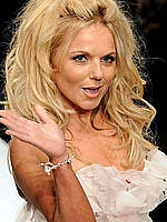 Geri Halliwell shows her legs at fashion show