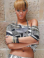 Rihanna exposed nude belly and sexy shoulders