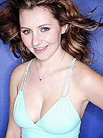 Beverly Mitchell sexy posing shows cleavage