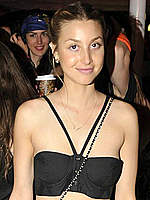 Whitney Port shows her long legs in nature