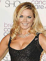Geri Halliwell shows cleavage at fashion show