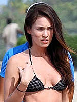 Megan Fox caught in black bikini on the beach