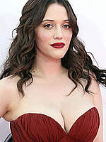 Kat Dennings shows deep cleavage in red dress