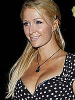Paris Hilton shows cleavage paparazzi shots