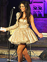Michelle Keegan shows legs at fashion show