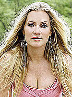 Emily Procter posing in nature mag photos